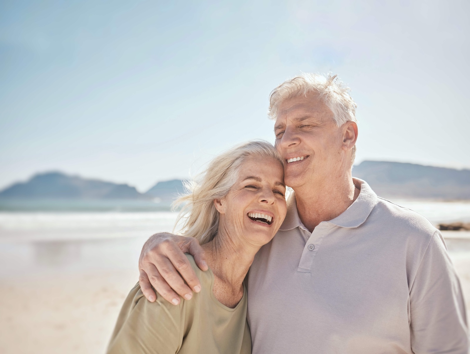 elderly couple on the beach